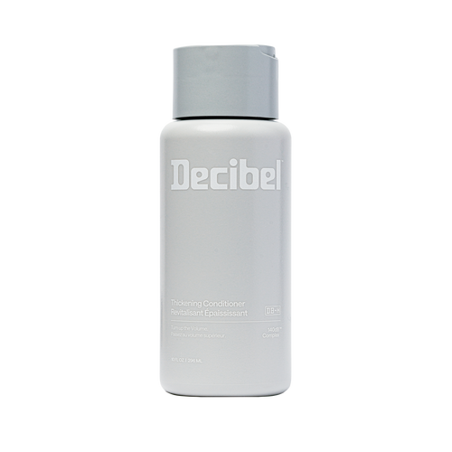 Thickening Conditioner van Decibel, lichtgrijze flacon met wit logo
