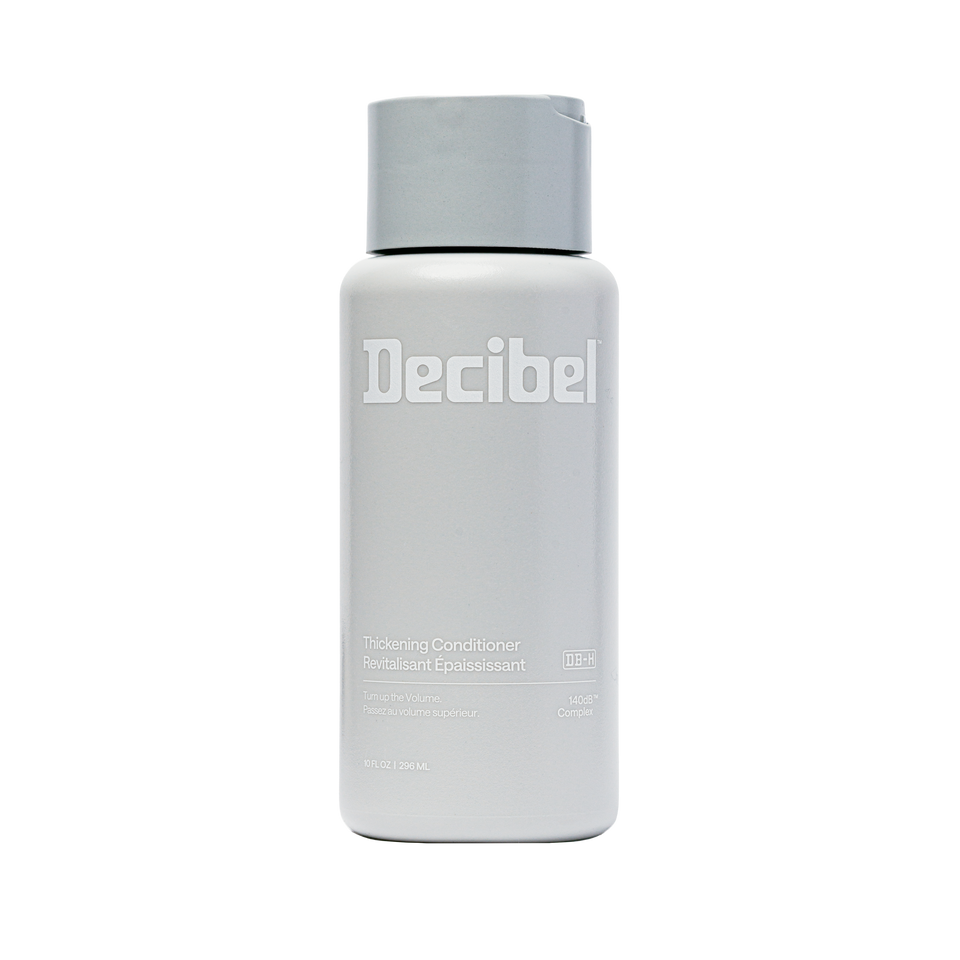 Thickening Conditioner van Decibel, lichtgrijze flacon met wit logo